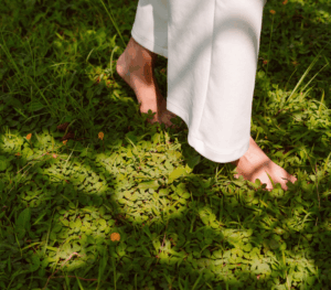 Social Care Worker taking a restorative break in Ireland, walking on grass